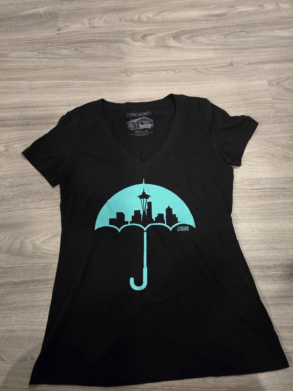 Black V-Neck Tee with Teal Seattle Umbrella Graphic